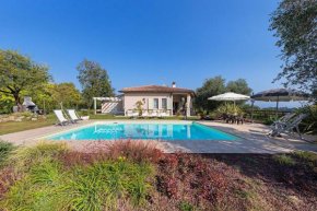 Villa Daniela con piscina vista lago by Wonderful Italy